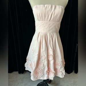 BCBG MaxAzaria strapless dress. Size 6. Full skirt, three dimensional flowers.